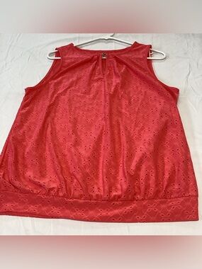 Sleeveless Eyelet key hole neckline. Coral color banded
